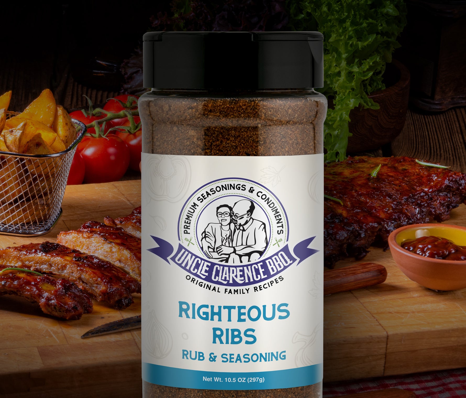Uncle Clarence BBQ rub for righteous ribs in a container with herbs and cooked ribs in the background