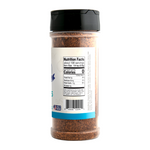 Uncle Clarence BBQ rub in a clear spice container with nutrition facts label visible