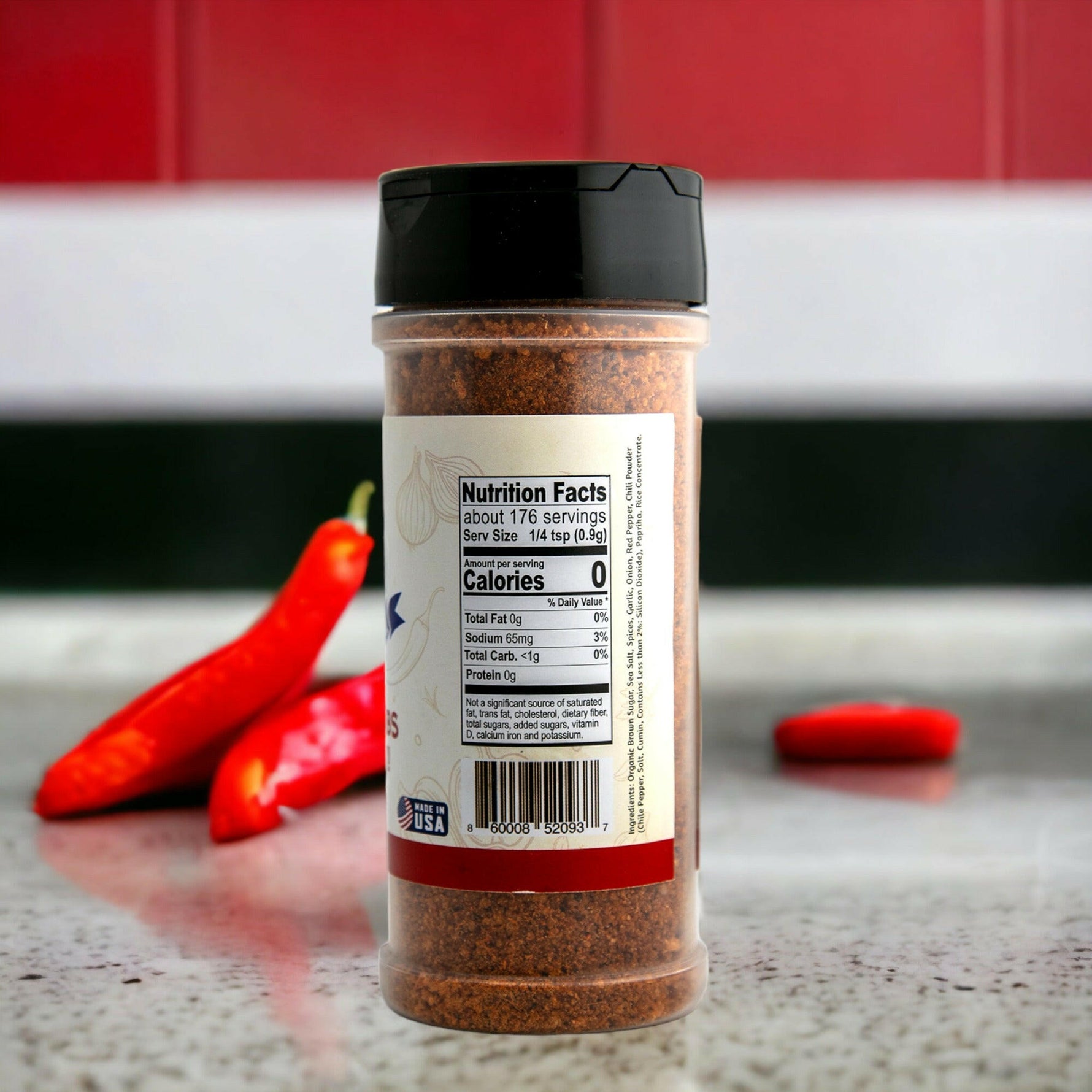 Uncle Clarence BBQ bold rib seasoning mix in a clear container with nutrition facts on the back