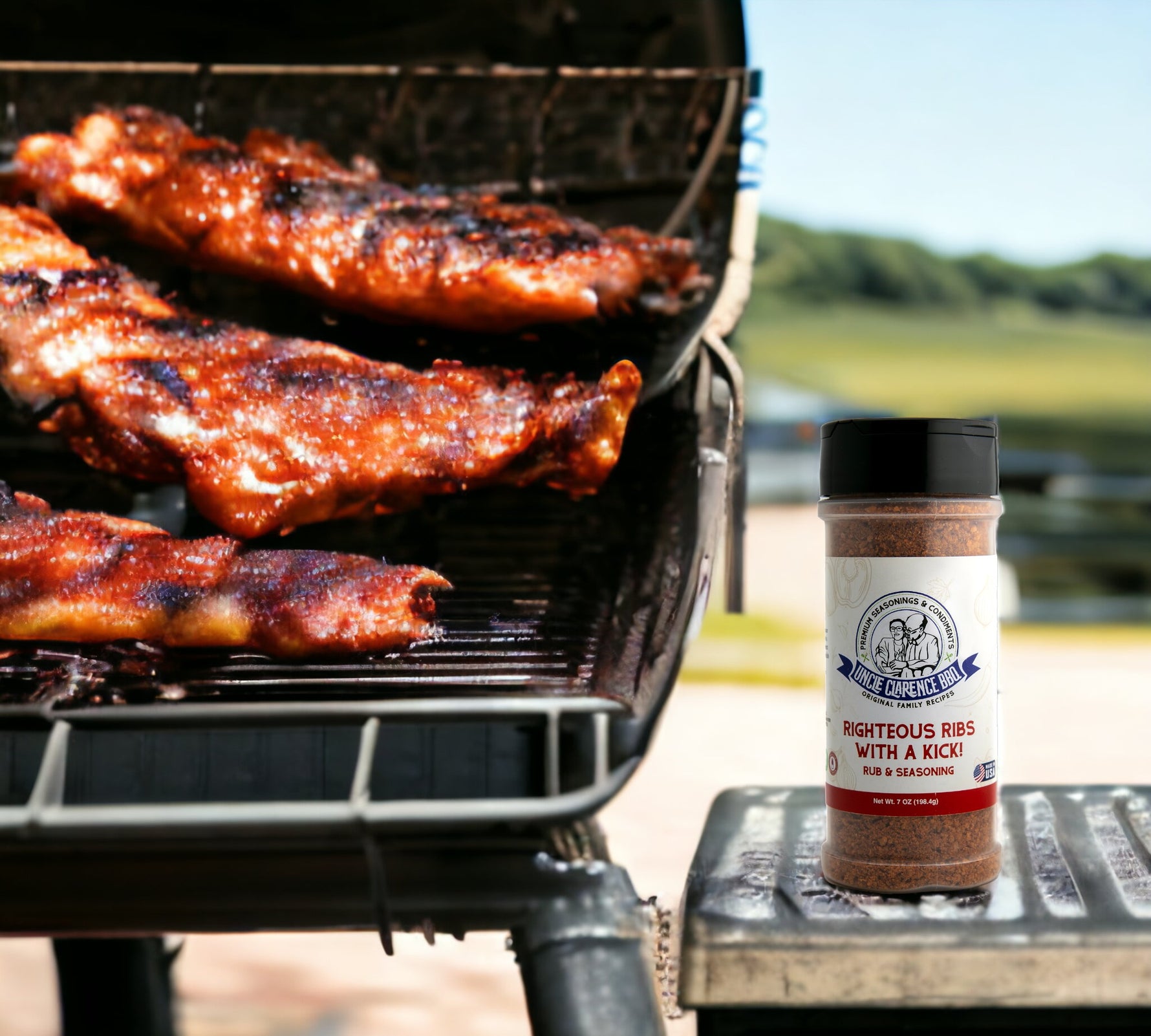 Uncle Cl Righteous Ribs barbecue rub and seasoning bottle next to grilled ribs on outdoor grill unique barbecue sauce gift